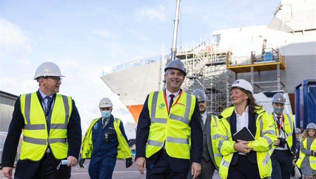 Mark Beverstock showing Cabinet Minister Keith Brown the new HMS Glasgow